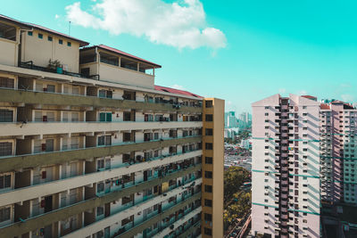 Low angle view of buildings against sky in city