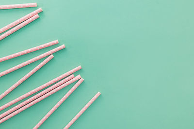High angle view of nails on blue background