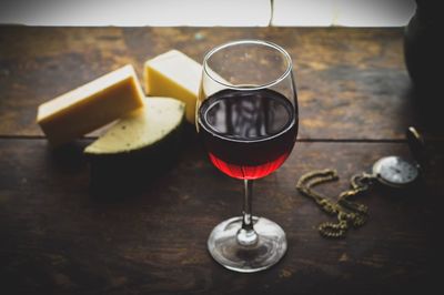 Close-up of wineglass on table