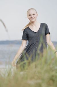 Portrait of a smiling young woman on beach