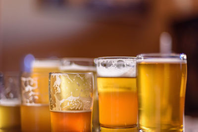 Close-up of beer glass on table