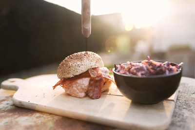 Close-up of burger with meat on table