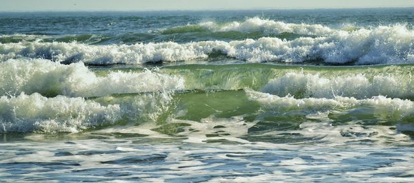 Waves splashing on rocks