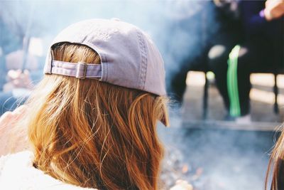 Rear view of woman wearing cap