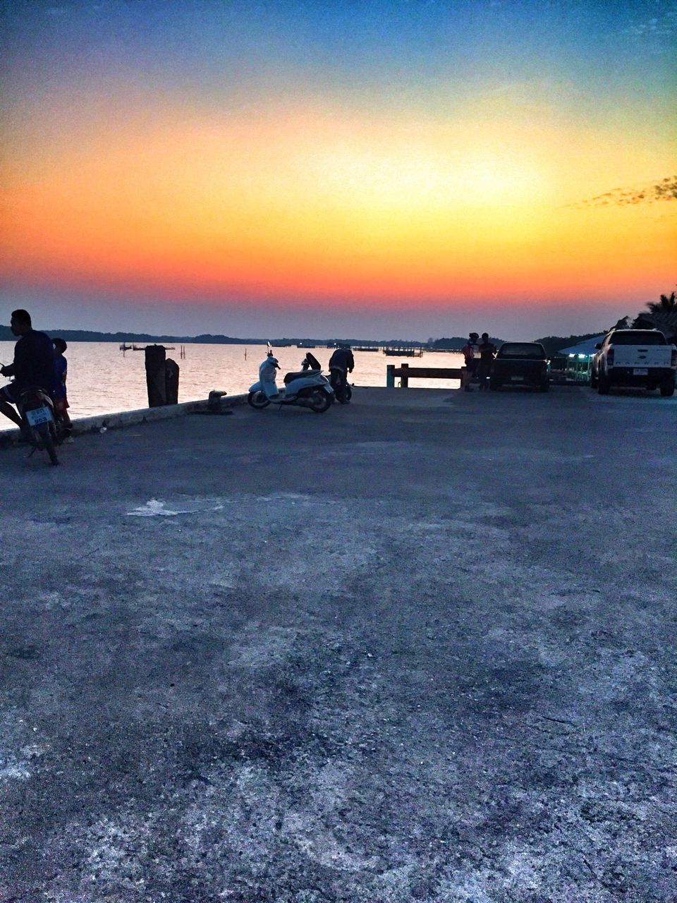 sunset, orange color, sea, sky, scenics, water, silhouette, tranquil scene, horizon over water, beauty in nature, tranquility, beach, idyllic, nature, copy space, transportation, dusk, shore, outdoors, incidental people