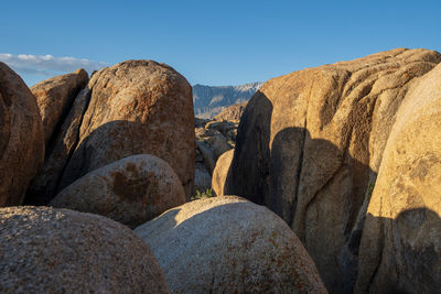 Panoramic view of rocks and mountains against sky