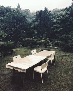 Chairs and table in forest