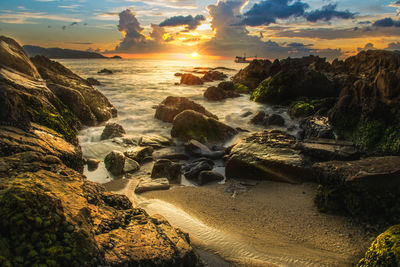 Scenic view of beach during sunset