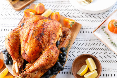 Close-up of roast turkey on table