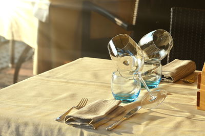 Close-up of glasses on table