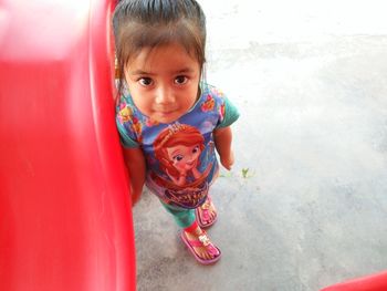 Portrait of cute girl standing outdoors