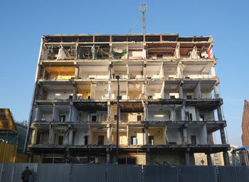 Low angle view of old building against clear sky