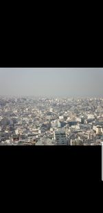 High angle view of buildings against clear sky