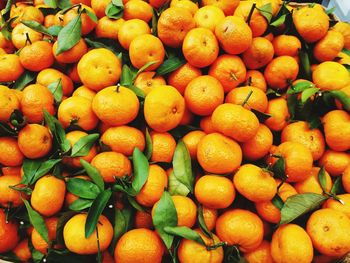 Full frame shot of oranges at market stall