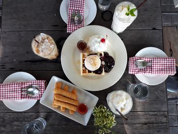 High angle view of food and drink on table