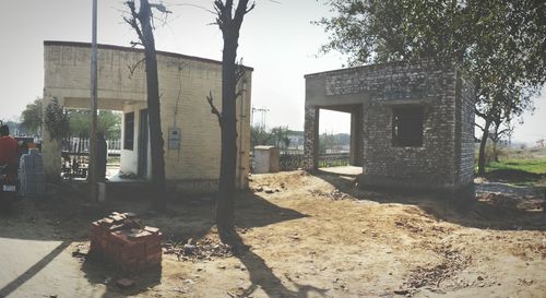 Old building with trees in background