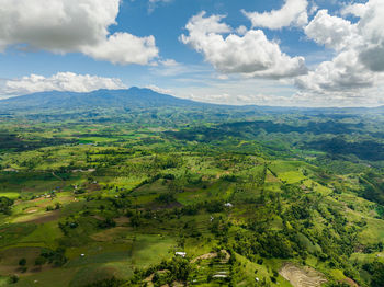 Aerial view of farmland in a valley in a mountainous province. negros, philippines