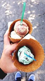 Midsection of person holding ice cream