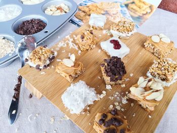 High angle view of desserts on wooden table