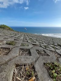 Low angle view through tiled platform, viewpoint on parangtris beach, java, indonesia