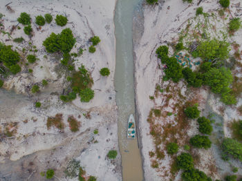 Droneshot of estuary of river scenery and a boat which is located in johor, malaysia.