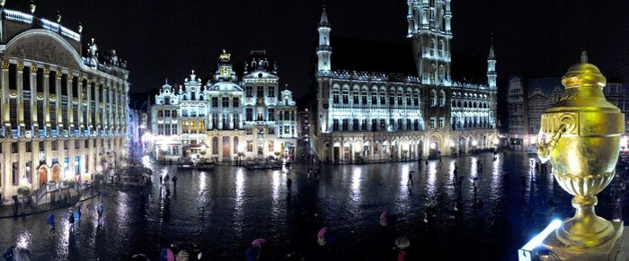 Reflection of illuminated buildings in canal at night