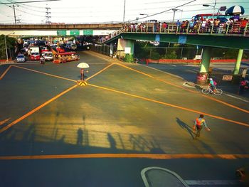 High angle view of people on road against sky