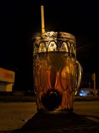 Close-up of glass jar on table