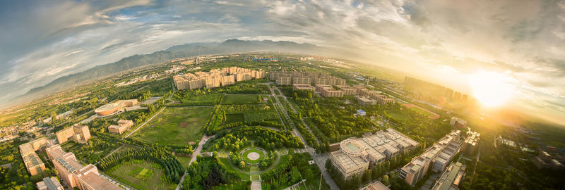 High angle view of buildings in city against sky