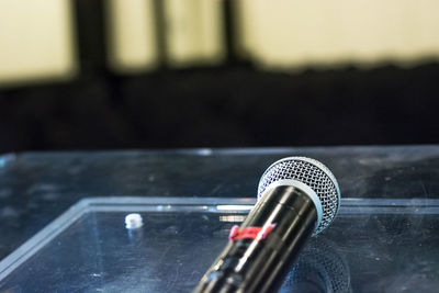 Close-up of mobile phone on table