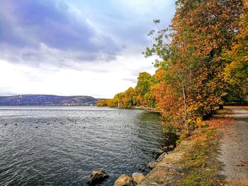 Scenic view of lake against sky during autumn