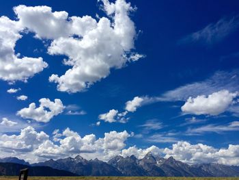 Low angle view of clouds against blue sky