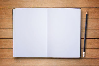 Directly above shot of open book on table