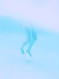 Close-up of person swimming in sea