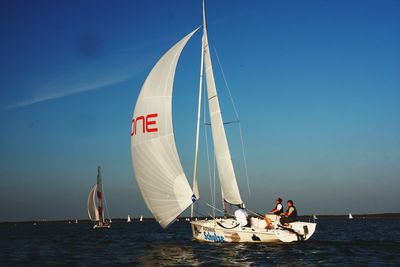 Boats sailing in sea