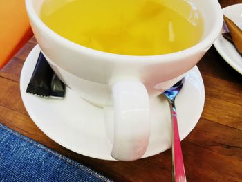 Close-up of coffee cup on table