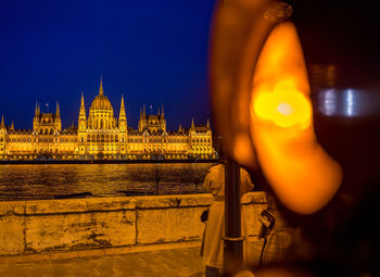 Illuminated city lit up at night