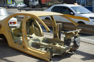 Disassembled car frame on the street. car after an accident. unsuitable vehicle for use. 