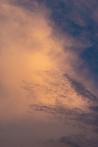 Low angle view of clouds in sky during sunset