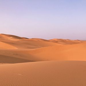 Scenic view of desert against clear sky