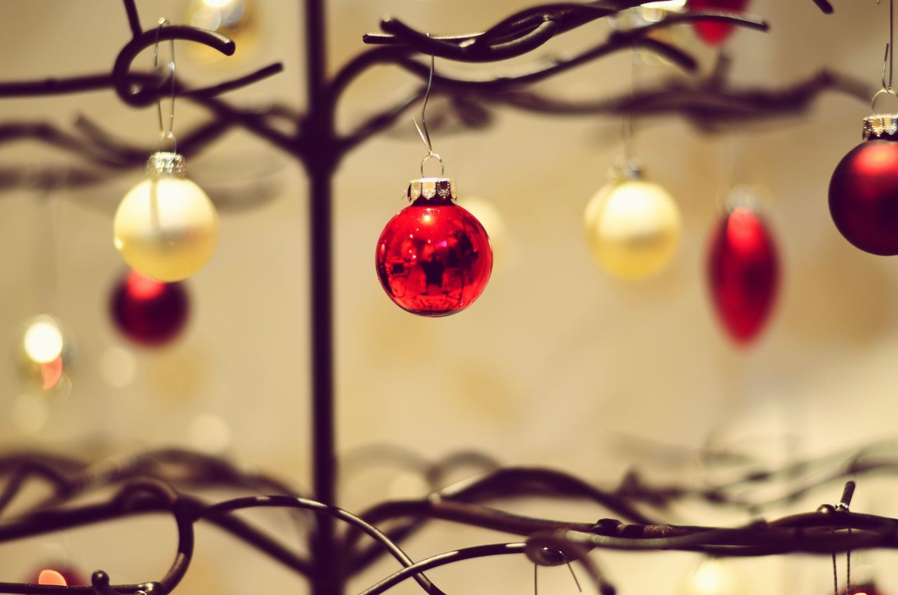 hanging, red, christmas, celebration, christmas ornament, focus on foreground, christmas decoration, bauble, christmas tree, no people, holiday - event, close-up, indoors, tree, day