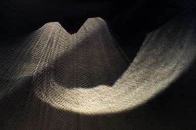 High angle view of shadow on wood