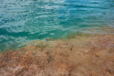 High angle view of surf on beach