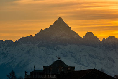 Scenic view of mountains against sky during sunset