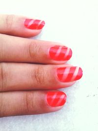 Close-up of woman hand on red background