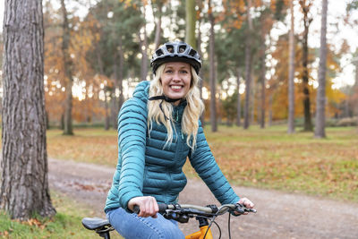 Portrait of smiling man riding bicycle