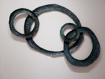 High angle view of heart shape decoration on white background