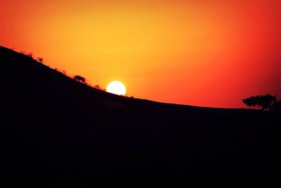 Silhouette of landscape at sunset