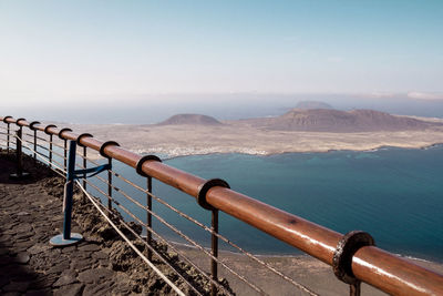 Railing at mirador del rio against sky