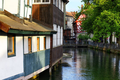 Canal amidst buildings in city